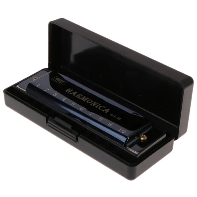 Black harmonica with case on a white background