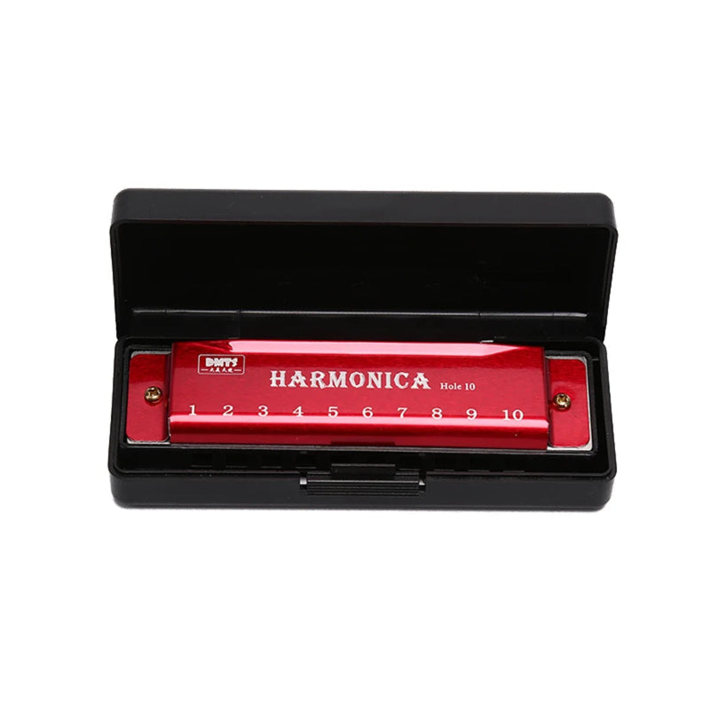 Red harmonica with black case on a white background