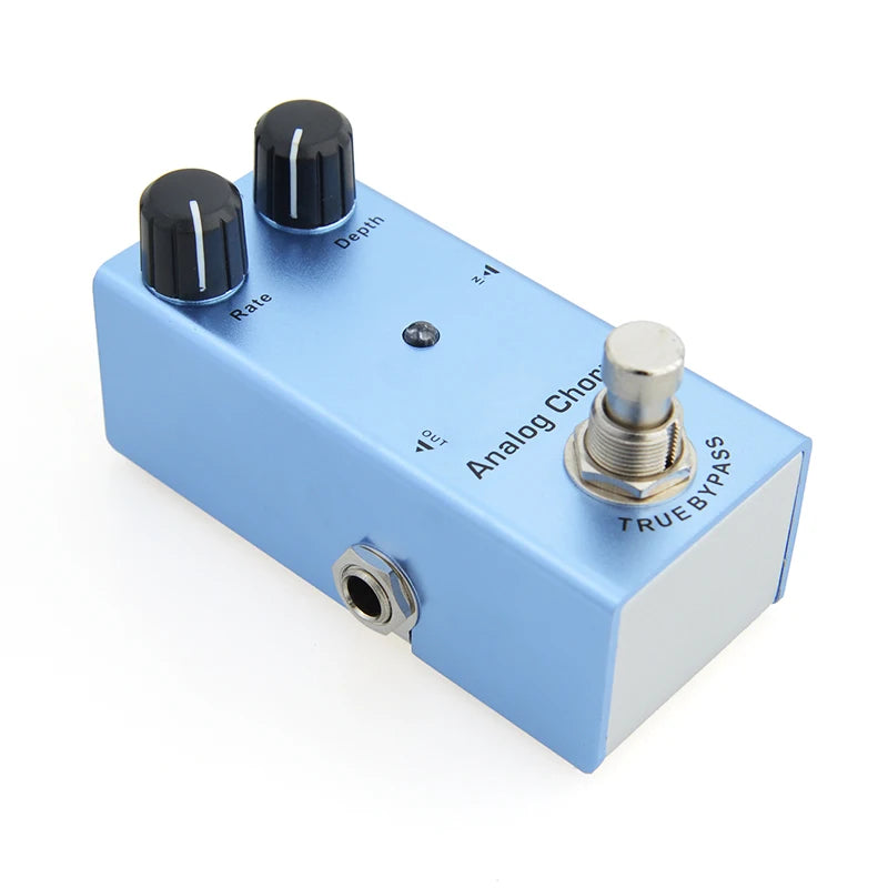 Blue guitar effects pedal with knobs and switch on a white background