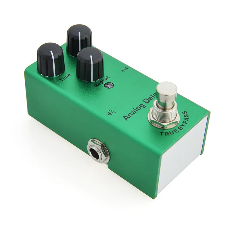 Green guitar effects pedal with knobs and switch on a white background