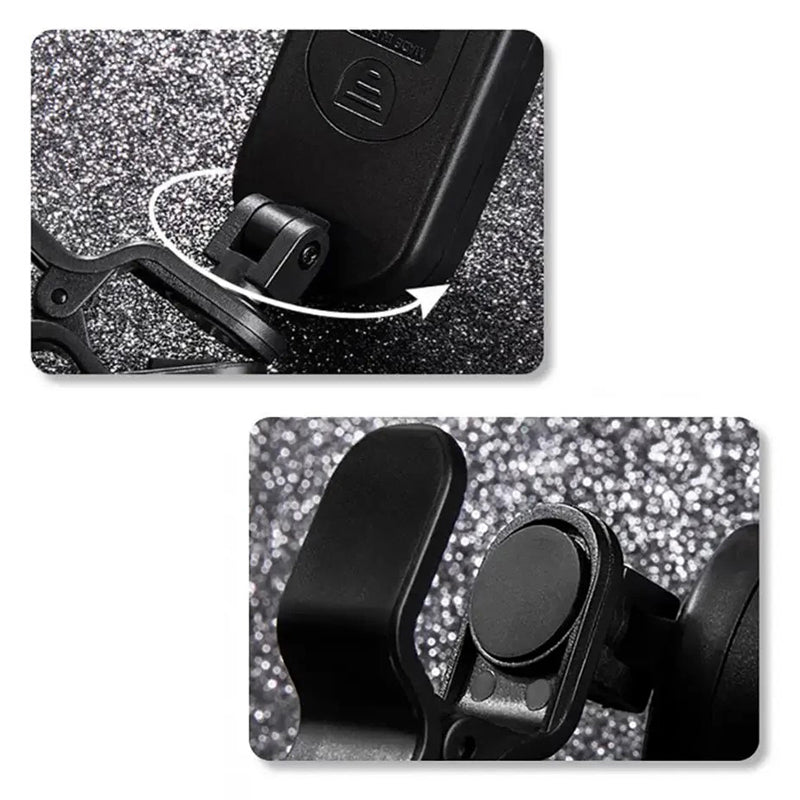 Close-up of a black phone holder with a textured background