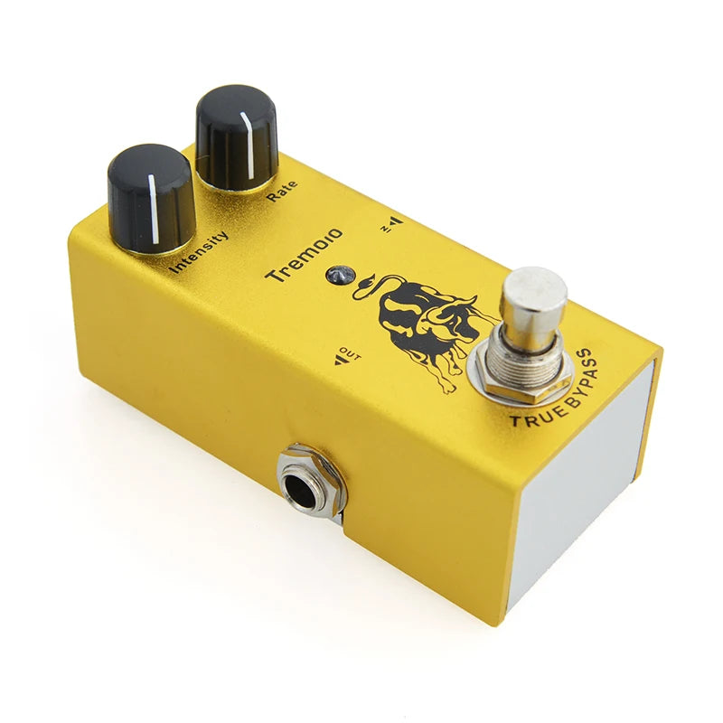 Yellow guitar effects pedal with black and white knobs on a white background