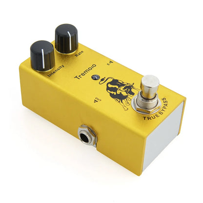 Yellow guitar effects pedal with black and white knobs on a white background