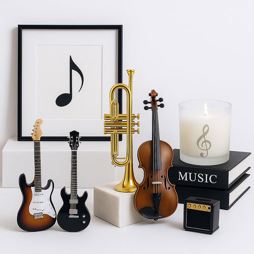 Music-themed decor items including guitars, a trumpet, a violin, a candle with a music symbol, and a framed note on a white background.